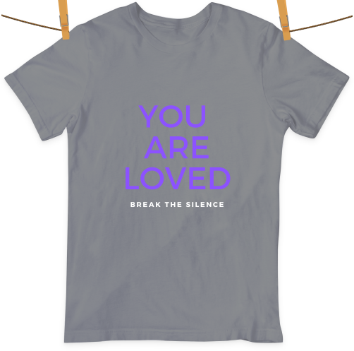 The colors I used to design this shirt are grey, purple, and white. The gray represents survivors of emotional, spiritual, or verbal abuse. I chose to write "You are loved," in purple to represent those who are attacked because of their sexual orientation. Although the world has become more open and modernized there are still people who are unable to be their true selves. Written in white, "Break the silence," represents those who died because of violence and to allow others to know that it is okay to stand up to others.